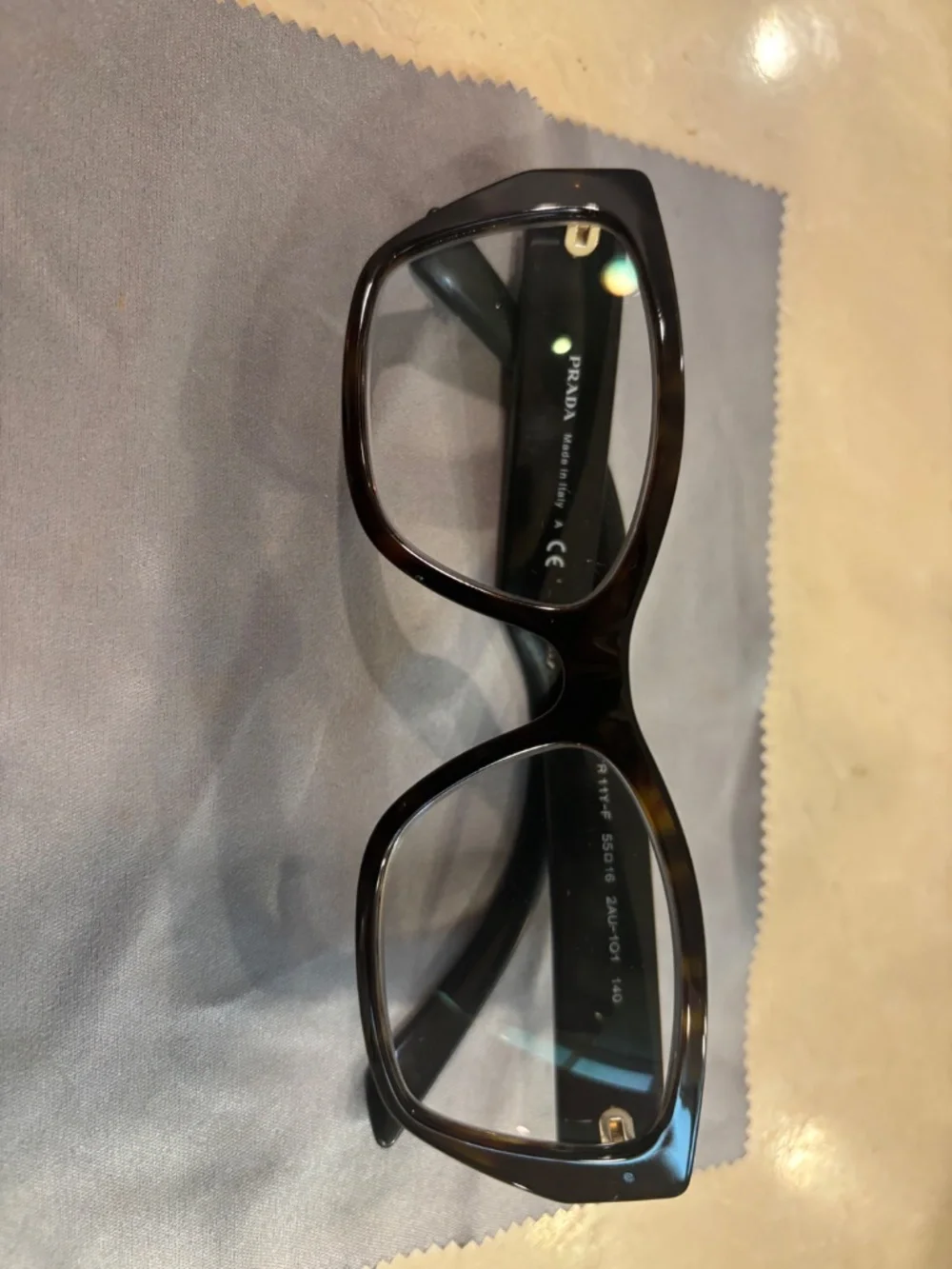 Lot of used Prada and Tom Ford glasses.